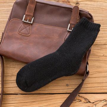 Chaussettes de tube moyen chaudes de laine épaisse