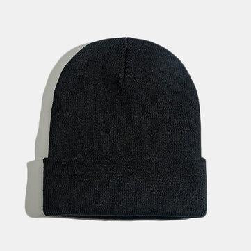 Chapeau en laine tricoté de couleur unie