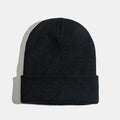 Chapeau en laine tricoté de couleur unie