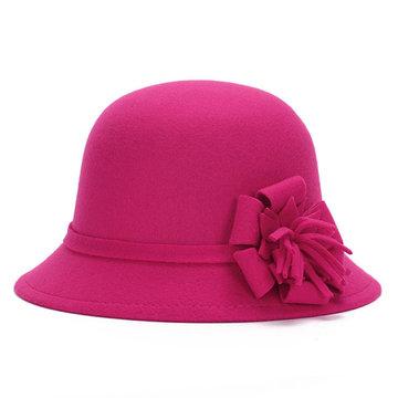 Vintage faux wool hat adorned with winter flower bob in felt